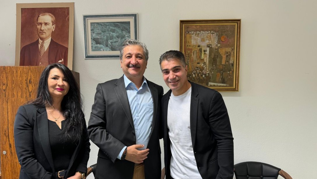 Kick Boks Dünya Şampiyonu Gökhan Arslan ve eşinin Eğitim Ataşemizi ziyareti